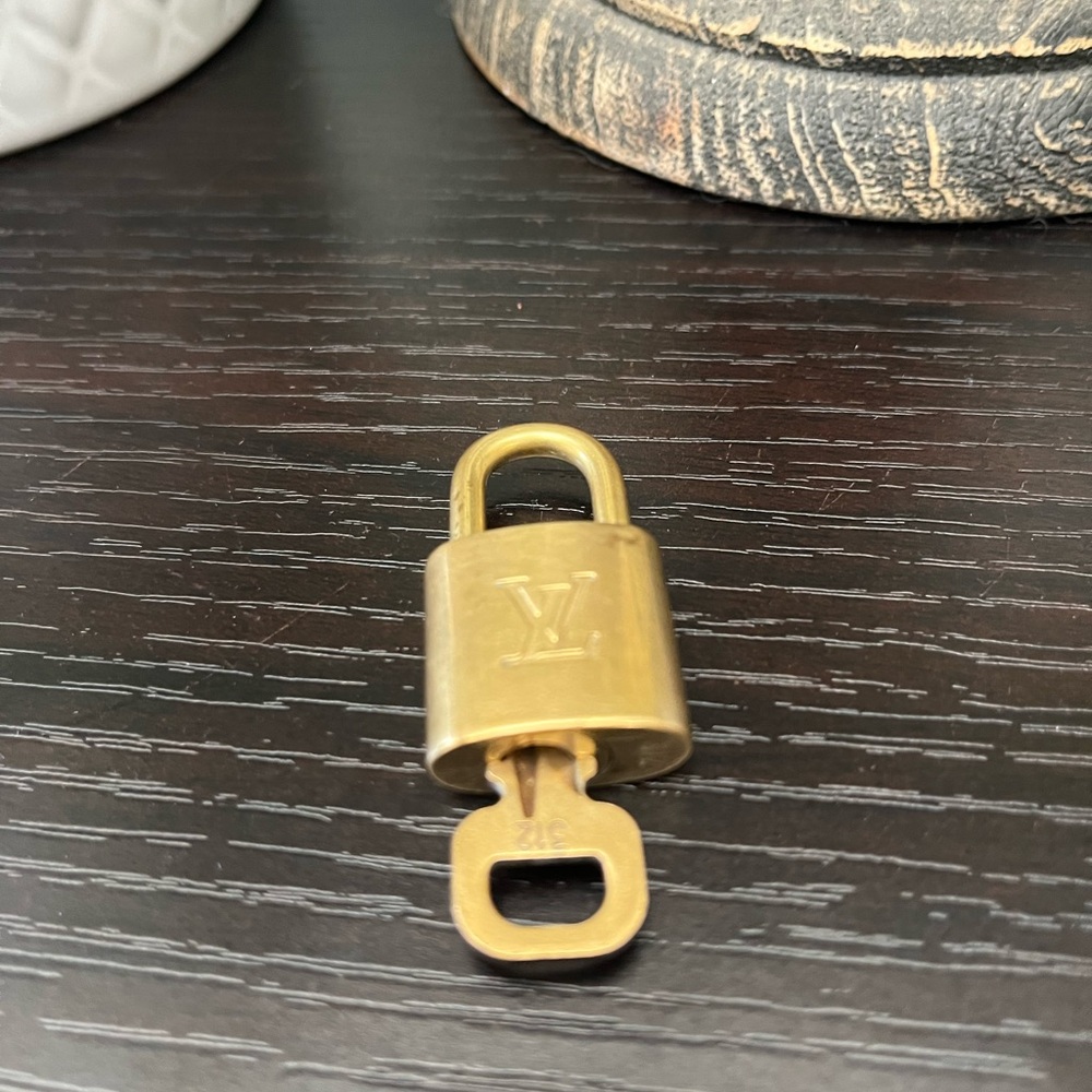 Louis Vuitton Gold Key Holder Accessory